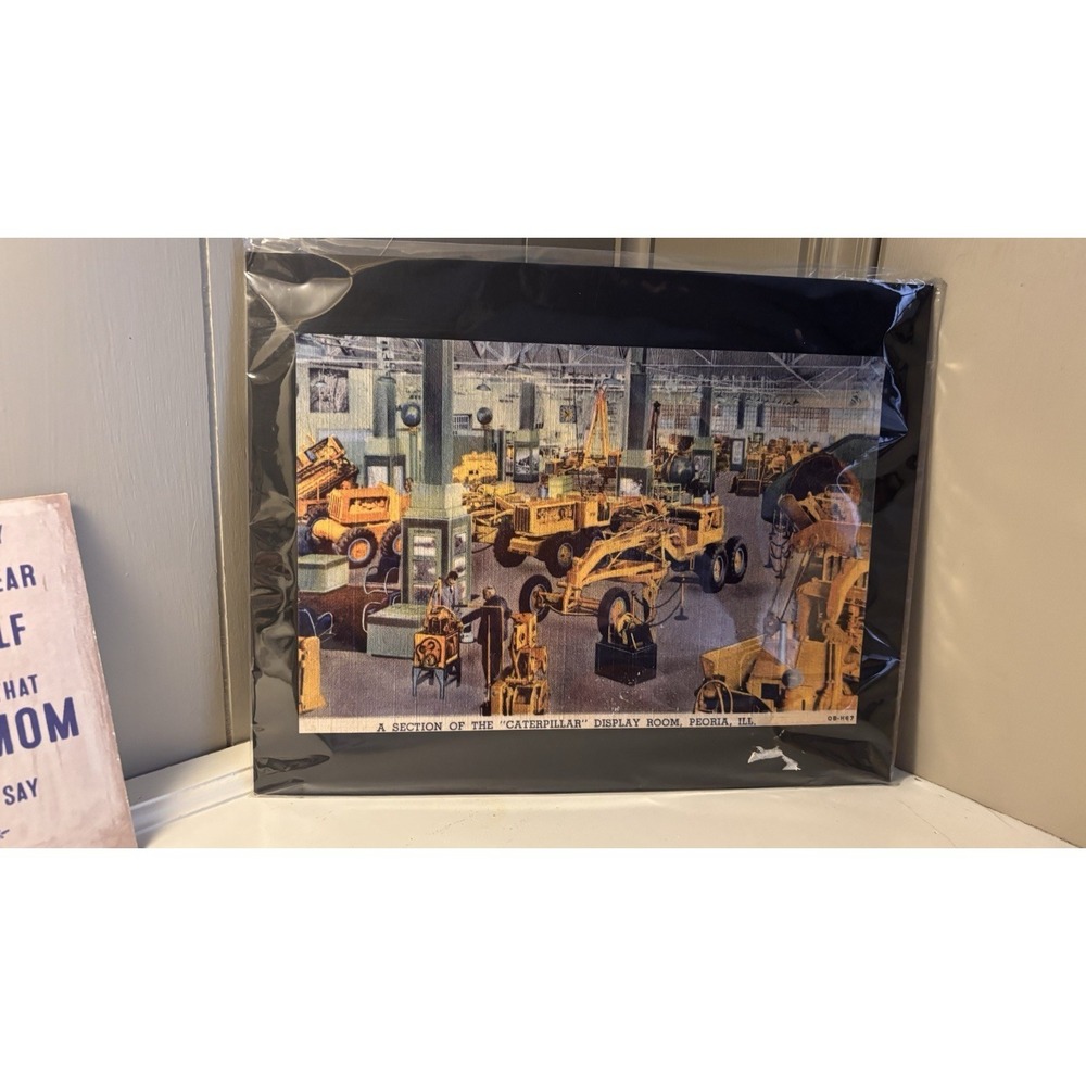 A SECTION OF THE CATERPILLAR DISPLAY ROOM, PEORIA, ILL. Tractor 1967 Mat Print